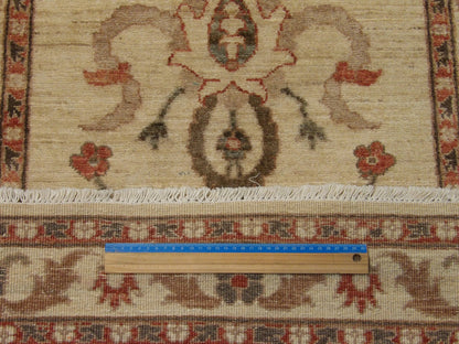 Beige Oushak runner in hallway setting