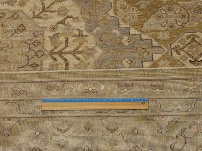 Gold and gray Khotan rug in room setting