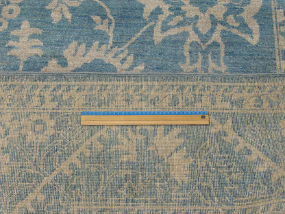 Full room view of Oushak Chobie hand-knotted rug