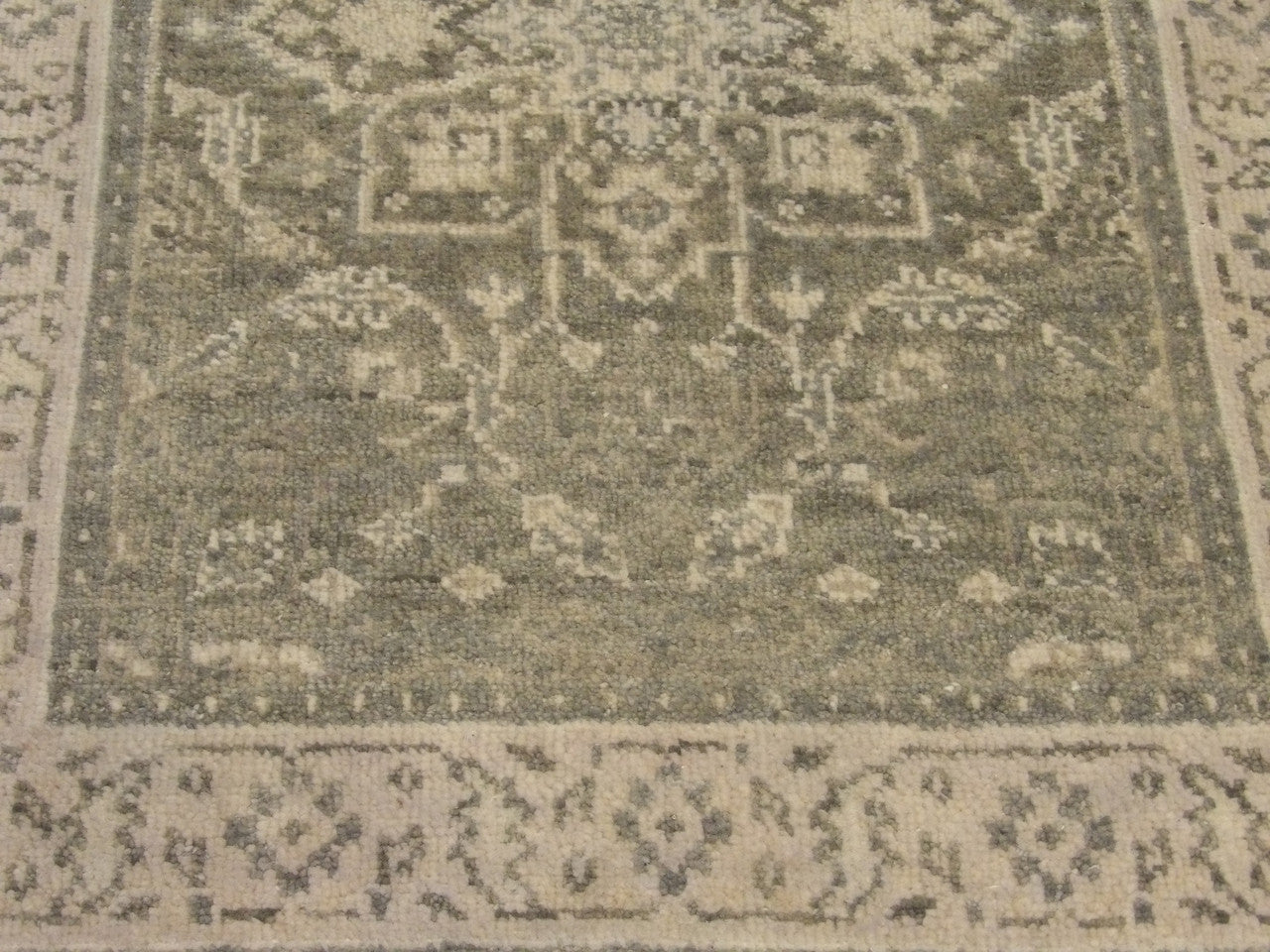 Wash Oushak rug border detail