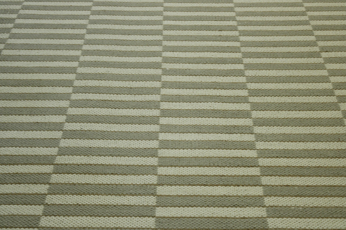 Close-up of wool pile, Green & Beige rug