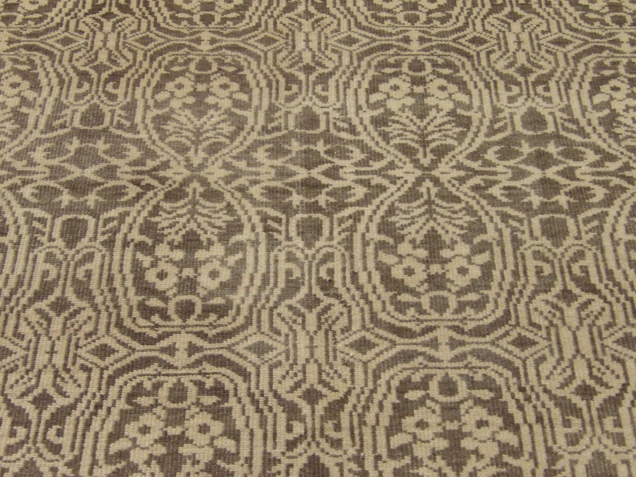 Damask rug fringe and edge detail