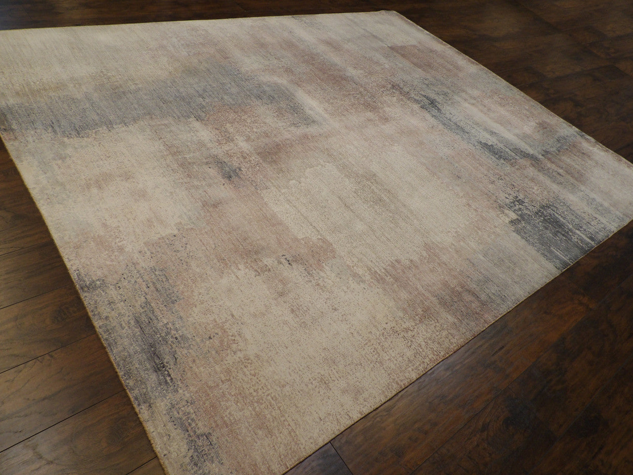 Abstract mosaic pattern detail, oxidized gray rug