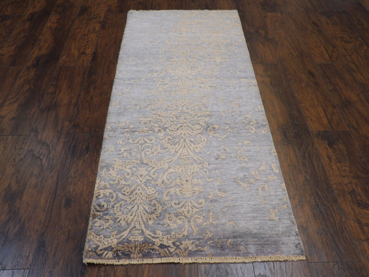 Back of transitional hand-knotted runner