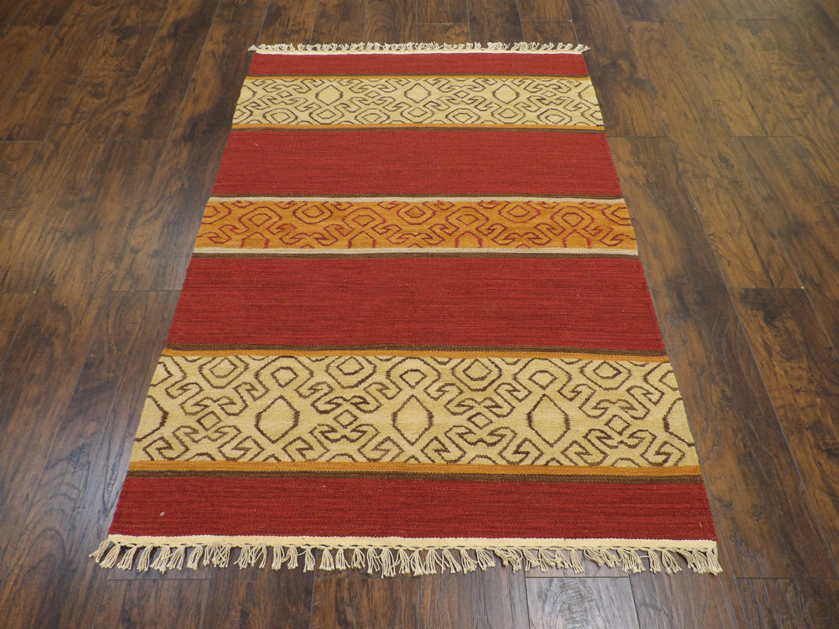 Close-up of kilim flatweave texture, gold rug