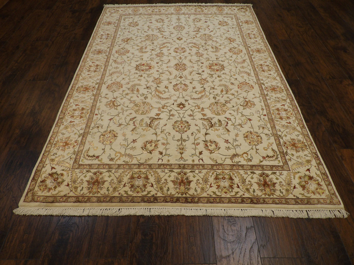 Close-up of silky wool-silk pile, ivory rug