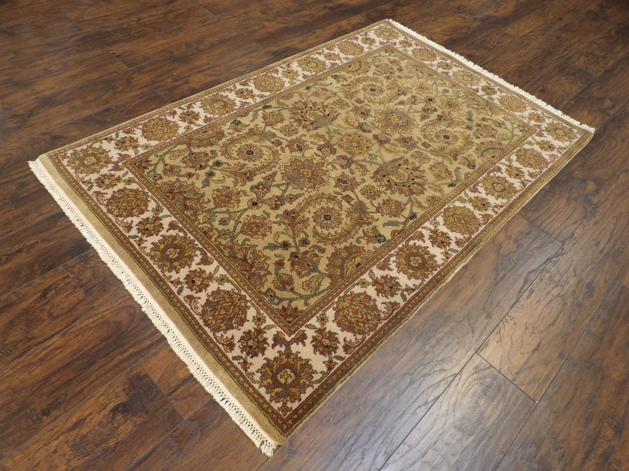 Kashan medallion pattern detail, gold and beige antique wash rug