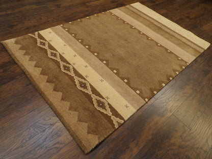 Gabbeh pattern detail, beige and brown natural dye rug