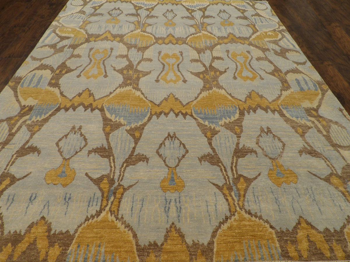 Close-up of wool pile, brown and gold rug