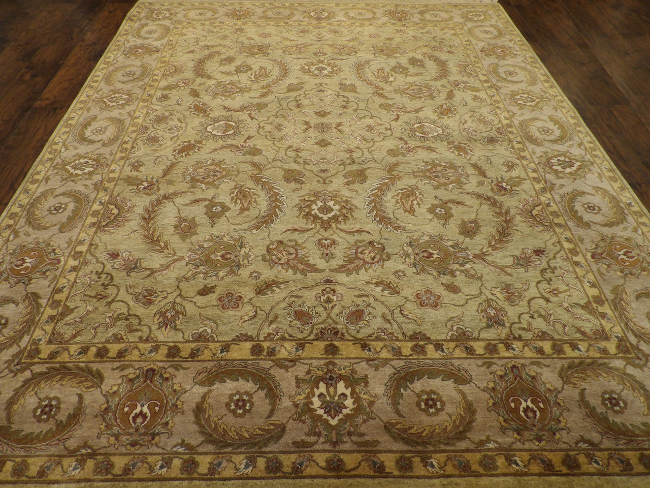 Back of hand-knotted green Ziegler tie-dye rug showing construction