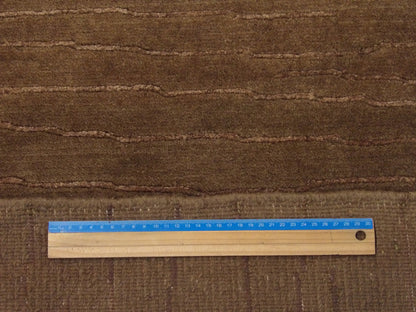 Brown plain modern rug in room setting