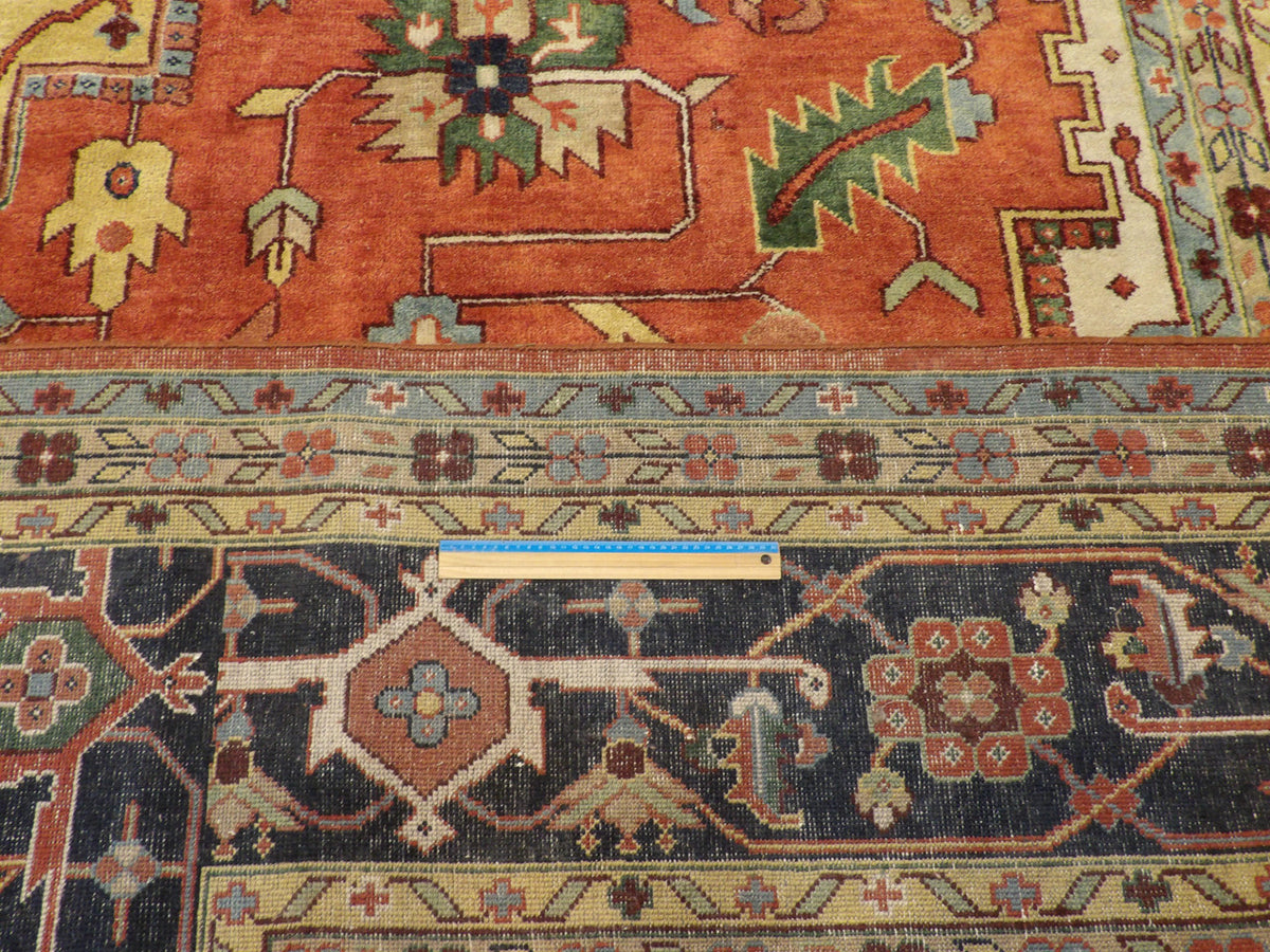 Full room view of palatial tribal Sherapi hand-knotted rug