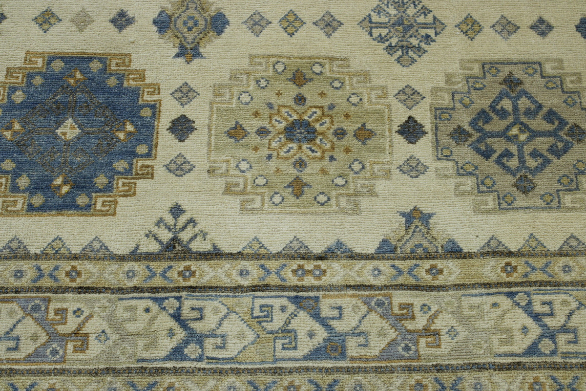Blue & Beige Tribal Super Kazak rug in room setting