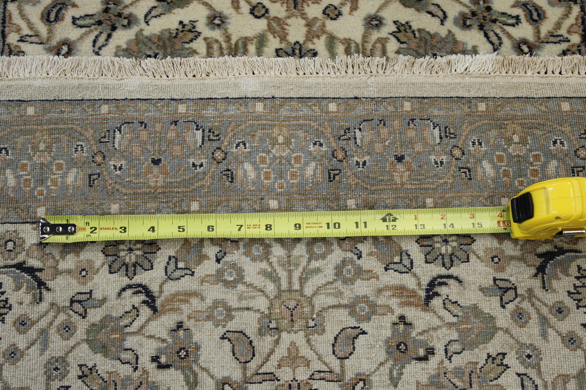 Back of Persian Mashad hand-knotted rug