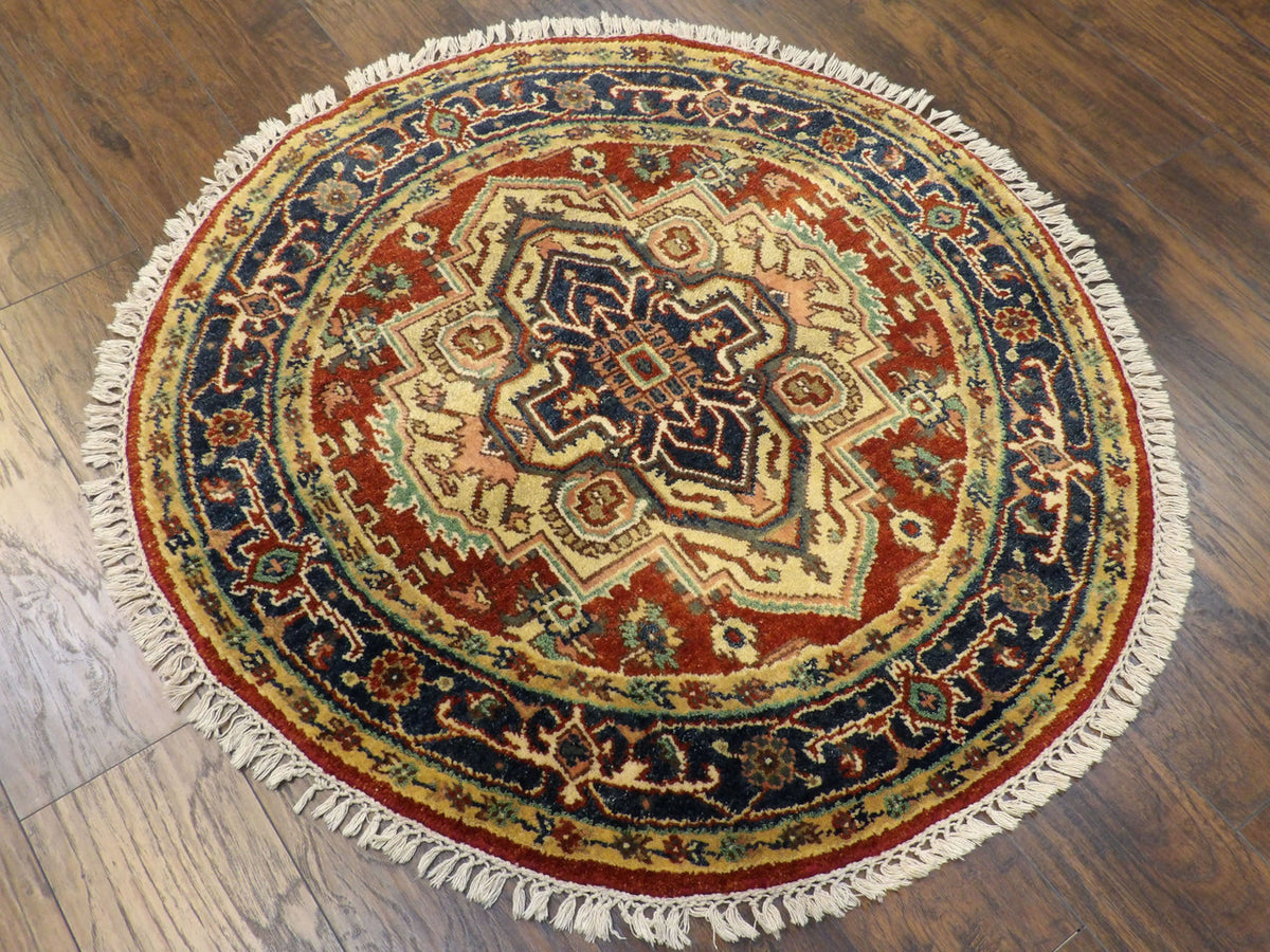 Full view of tribal Heriz round rug