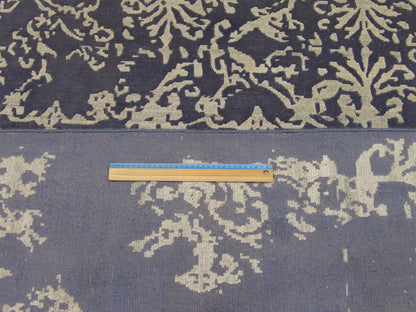Blue and gray abstract rug in room setting