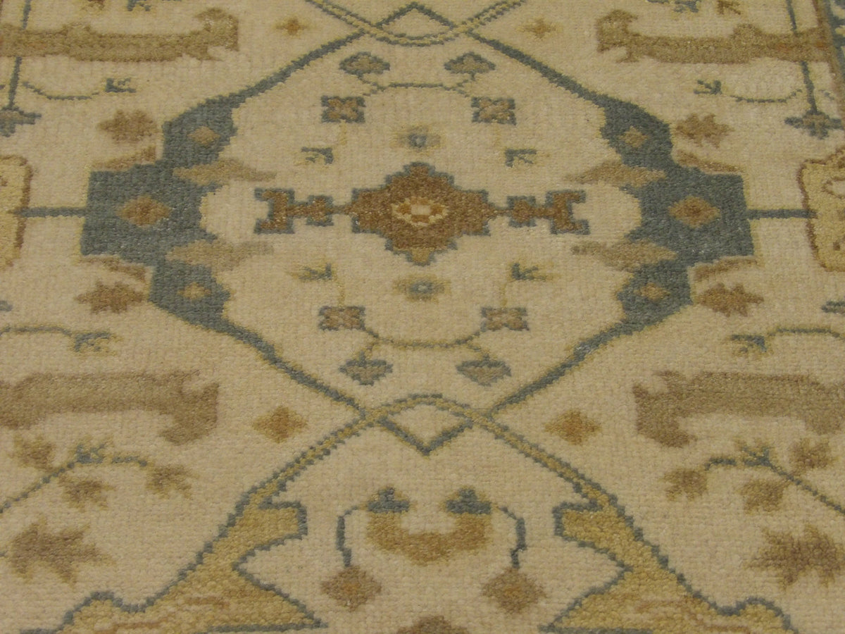 Back of Oushak hand-knotted rug
