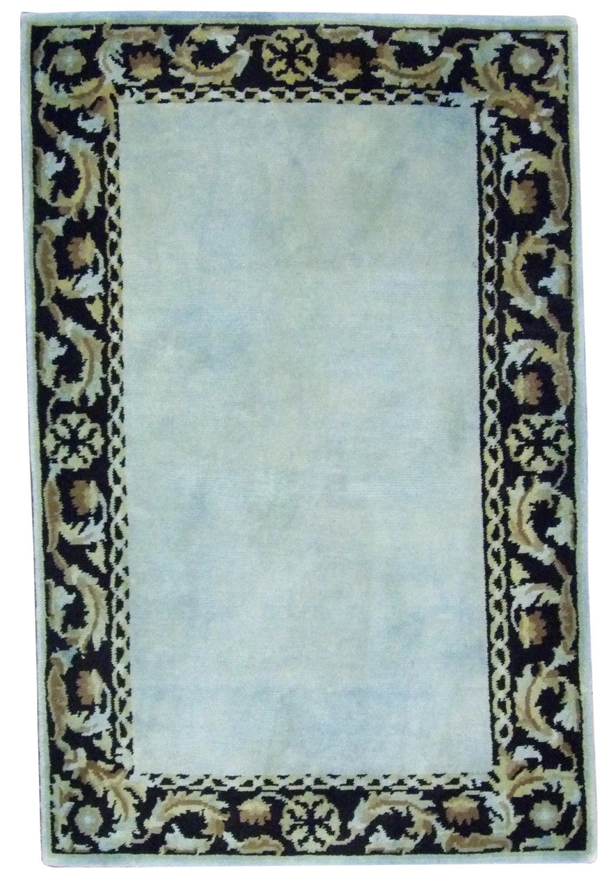 Modern European hand-knotted wool rug in Black & Teal, full view