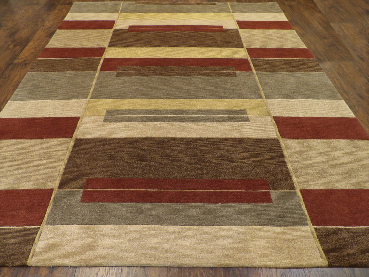 Gold geometric rug in a contemporary room setting