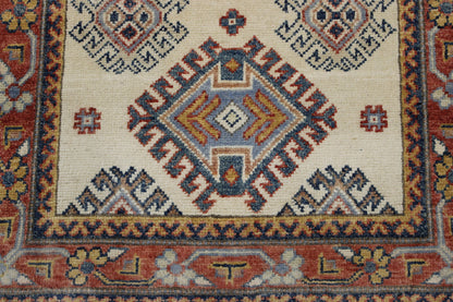 Tribal Super Kazak rug border detail
