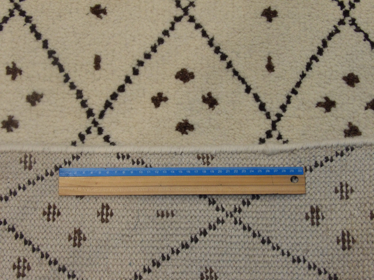 Brown & Beige Moroccan rug in room setting