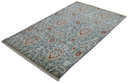 Close-up of wool pile, blue and red rug