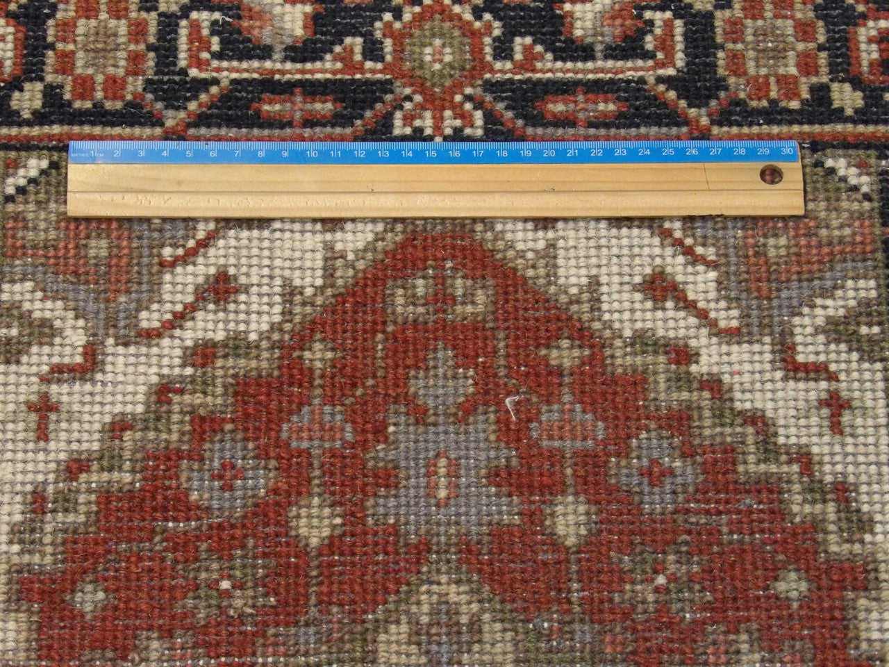 Black & Rust Tribal Heriz rug in room setting