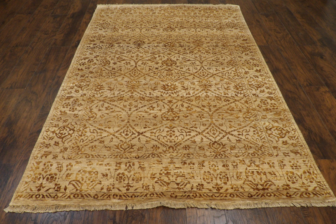 Close-up of wool-silk pile, brown and gold rug