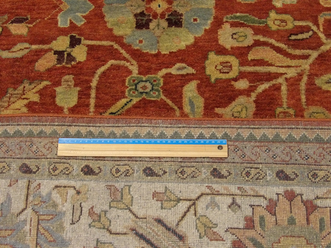 Beige & Rust Fine Persian Sherapi rug in room setting