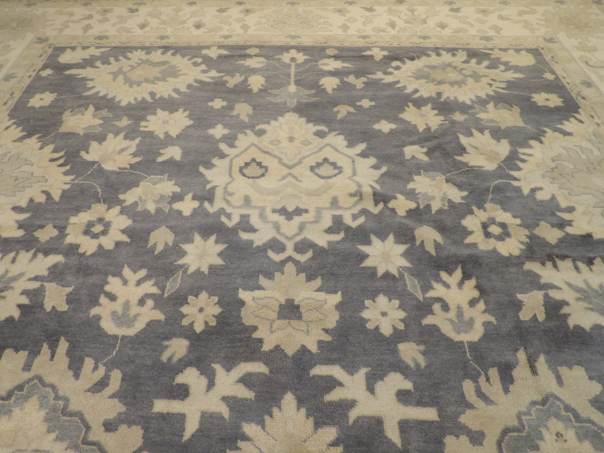 Back of Oushak hand-knotted rug