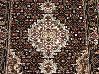 Back of Persian Mahi Tabriz hand-knotted rug
