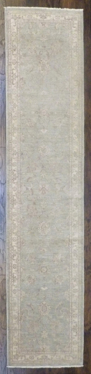 Oushak Chobi Wash hand-knotted wool rug in Green & Ivory, full view