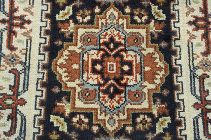 Black & Beige Tribal Heriz rug in room setting