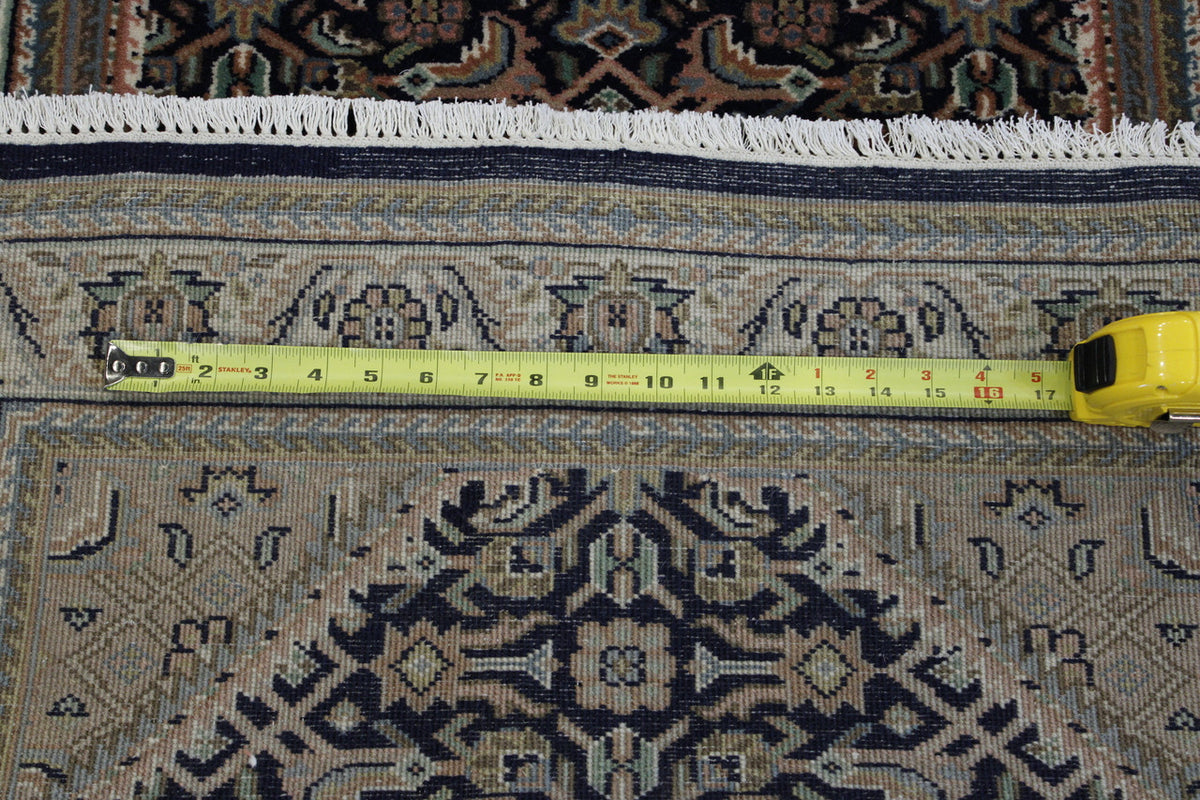 Green Traditional Fine Mir rug in room setting