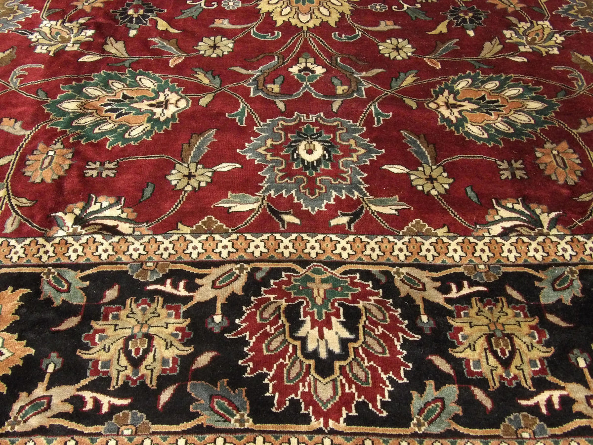 Antique Kashan rug border detail