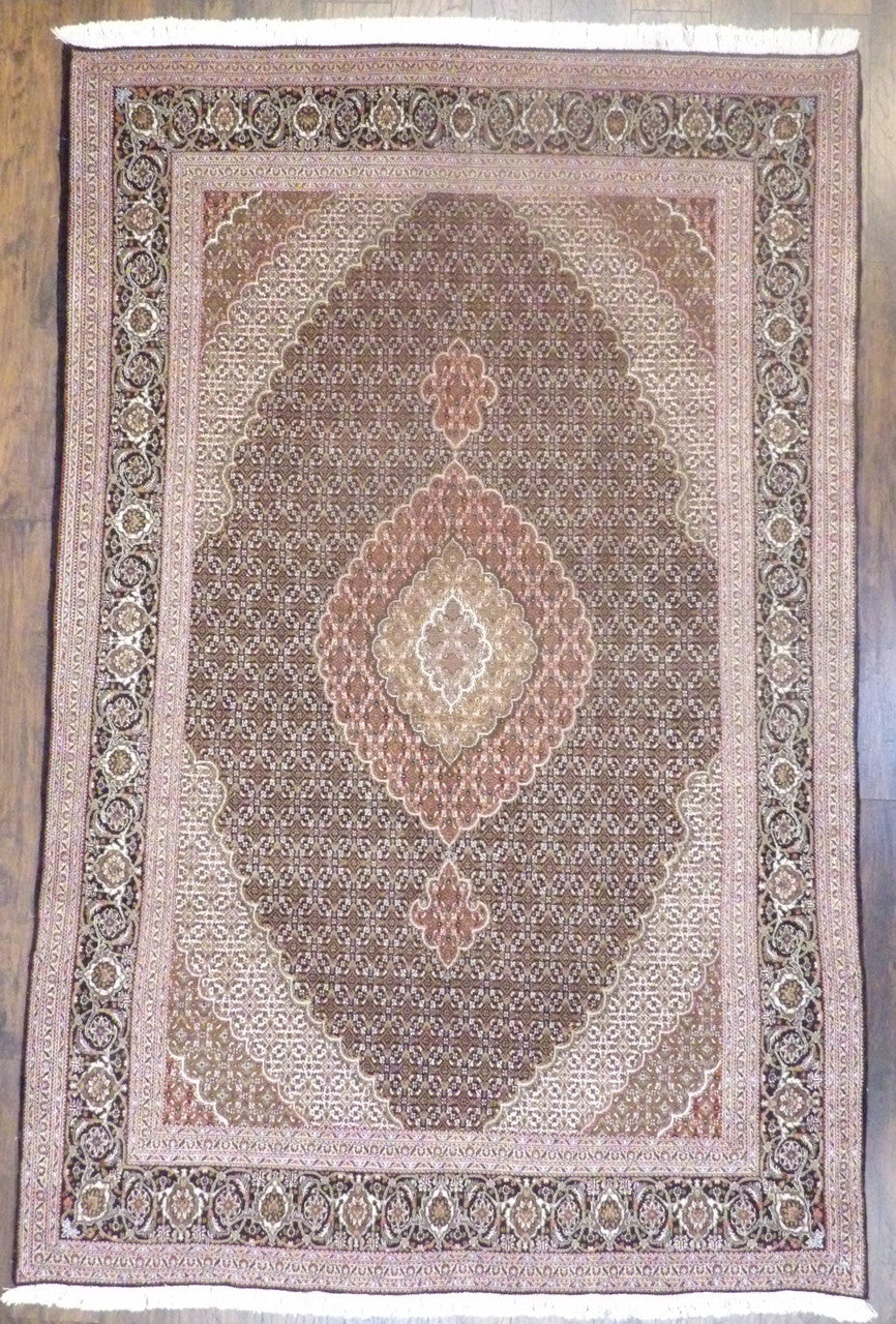Fine Persian Mahi Tabriz hand-knotted wool-silk rug in black, full view, 7x10