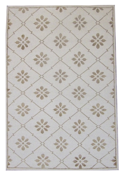 Transitional Moroccan floral diamond hand-knotted wool rug in gold and ivory, full view