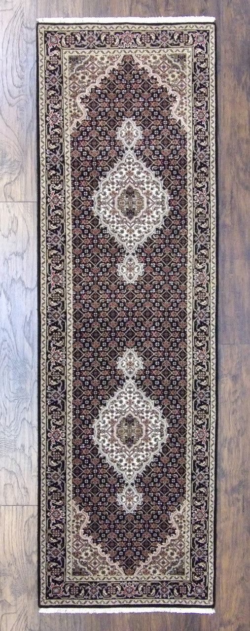 Fine Persian Tabriz hand-knotted wool runner in black, full view