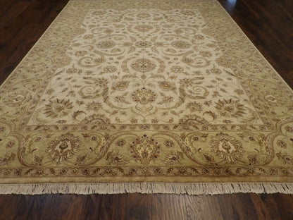 Close-up of wool pile, green and ivory rug