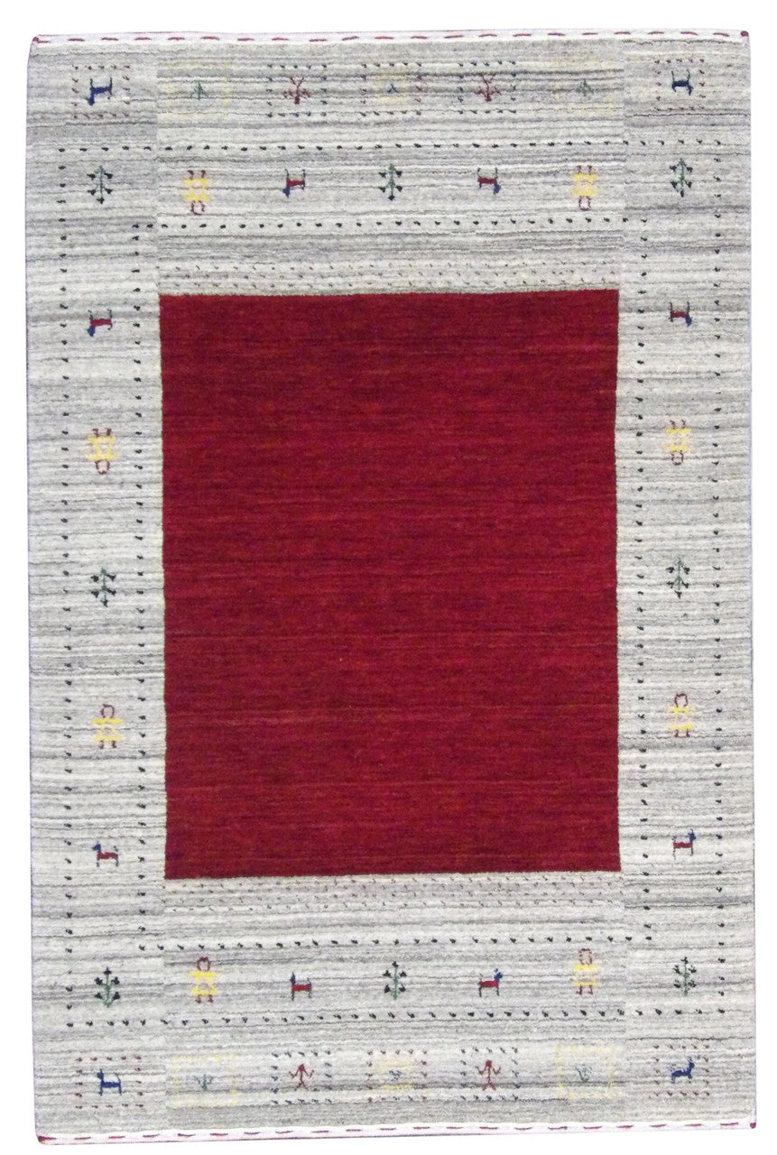 Gabbeh hand-knotted wool rug in beige and red, full view