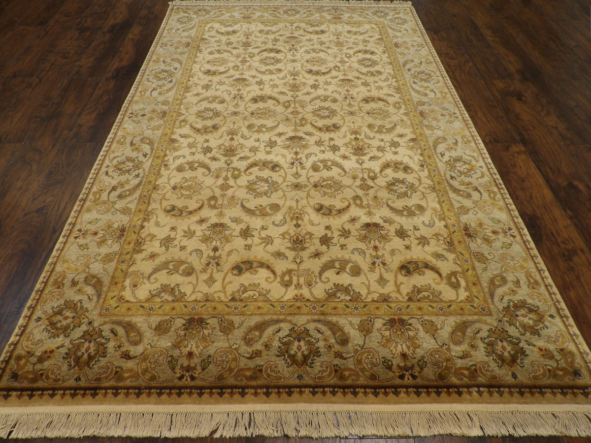 Close-up of wool pile, Green & Beige rug