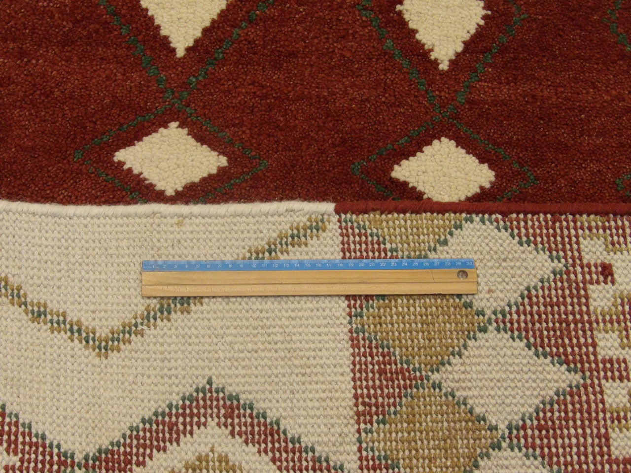 Beige & Red Moroccan Tulu Thick Pile rug in room setting