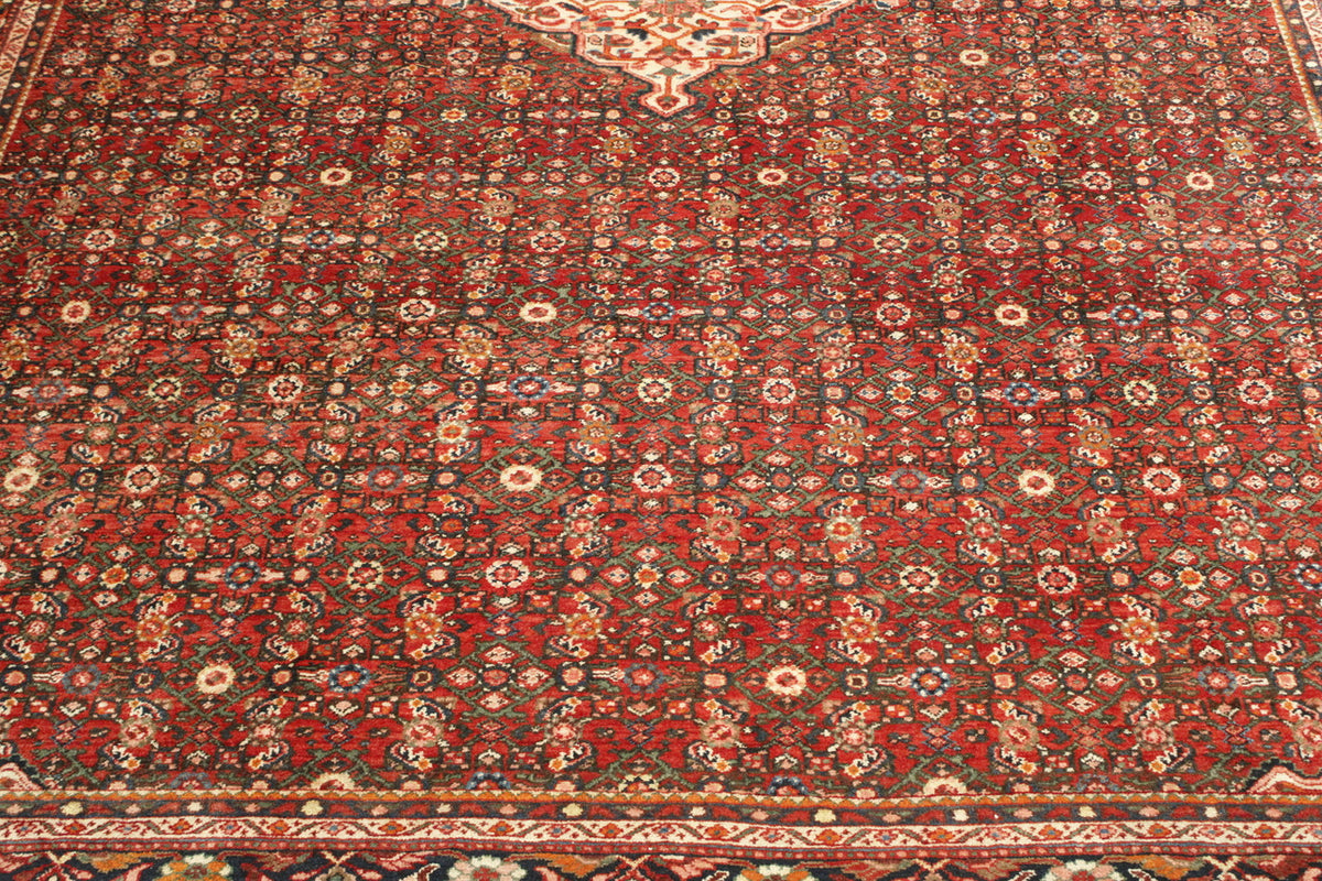 Blue & Pink Traditional Antique Bidjar rug in room setting