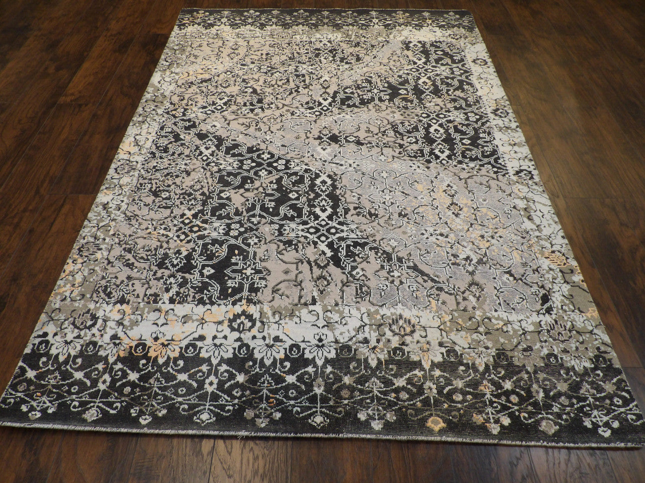 Back of hand-knotted broken design rug showing construction