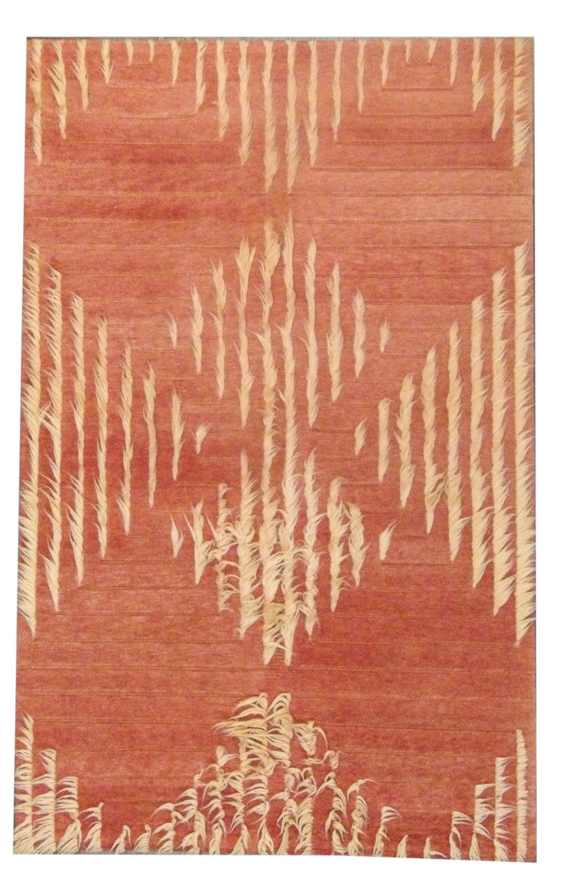 Modern high-low shag hand-knotted wool rug in gold and rust, full view, 5x8