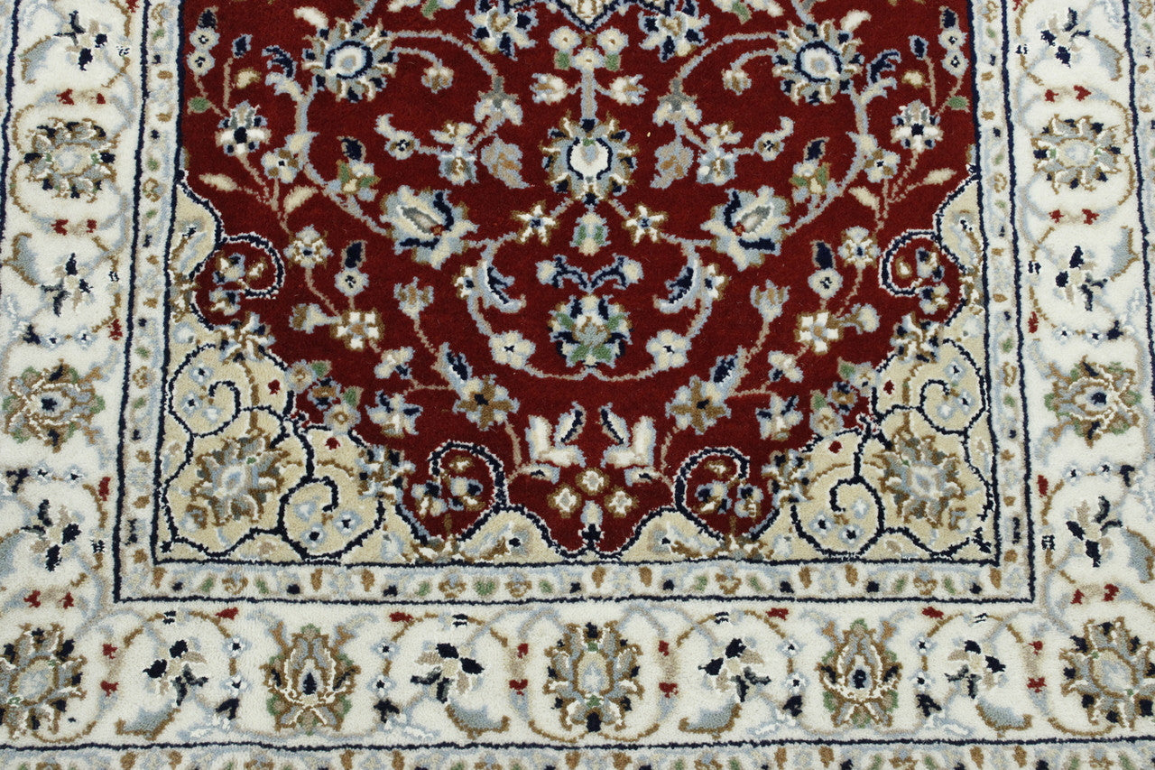 Beige & Red Traditional Fine Nain rug in room setting