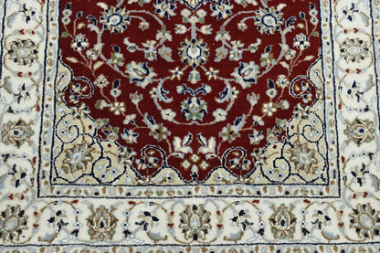 Beige & Red Traditional Fine Nain rug in room setting