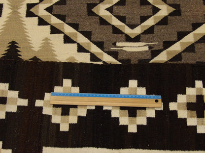 Ivory & Brown Tribal Navajo American Indian Tribe rug in room setting