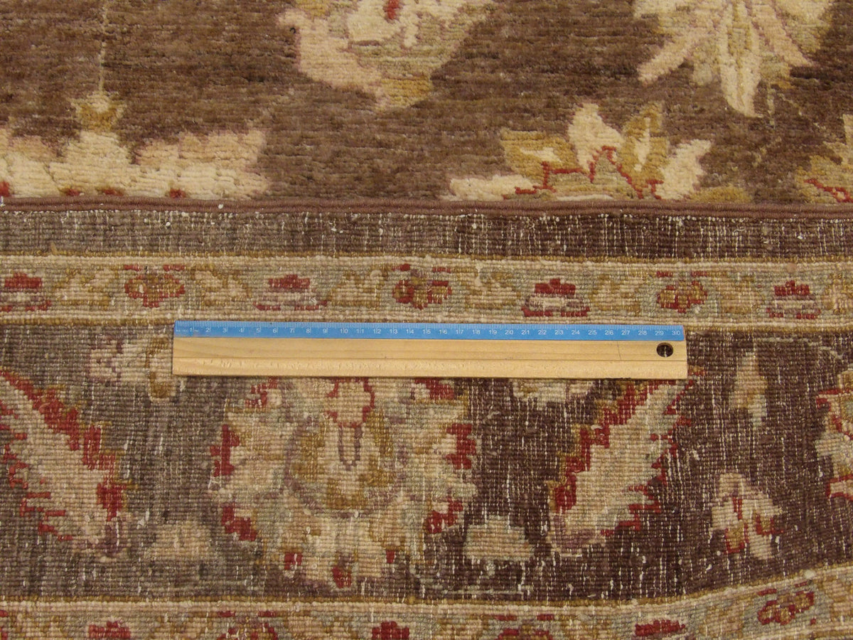 Full room view of Oushak Chobie antique wash hand-knotted rug
