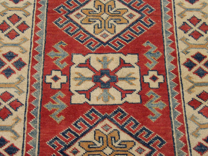 Back of Kazak hand-knotted rug